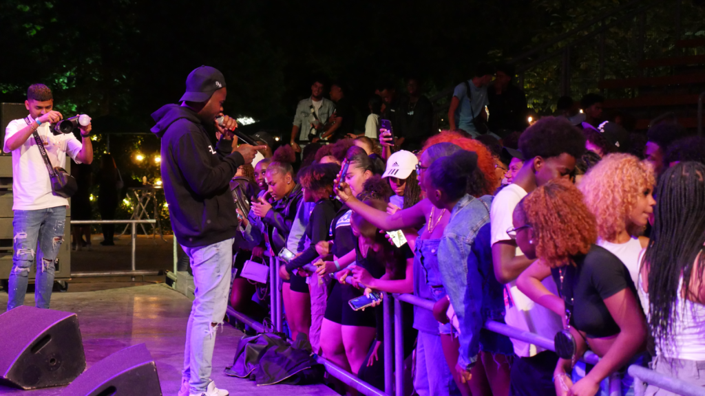 An artist sings during the youth summer fest.